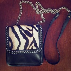 Henri Bendel crossbody black with animal print